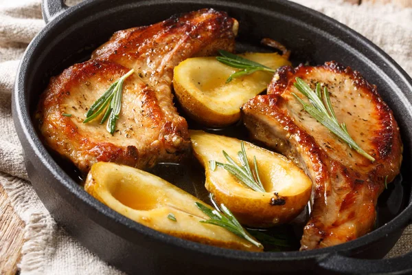Holiday recipe for baked pork chops with pears and rosemary in h — Stock Photo, Image