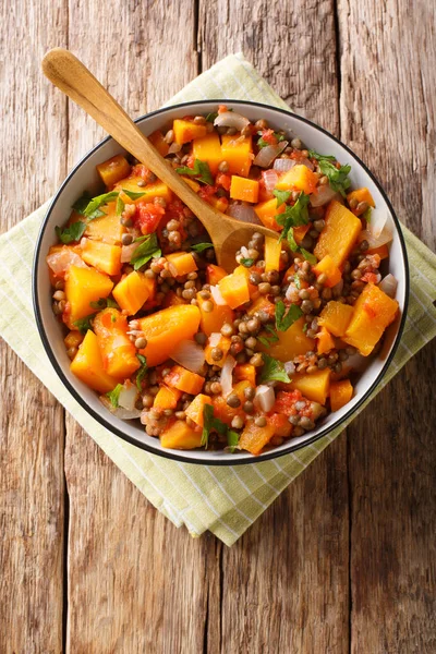 Spicy vegetable stew of pumpkins, tomatoes, lentils, onions and — Stock Photo, Image