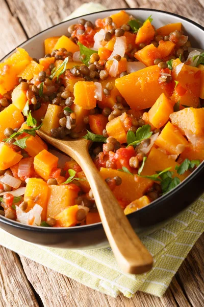 Pumpkin stew with lentils, onions and carrots close-up in a bowl — Stock Photo, Image