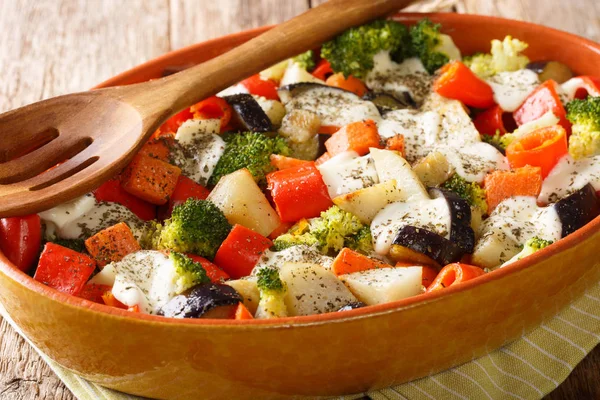 Healthy baked vegetables with mozzarella cheese close-up in a ba — Stock Photo, Image