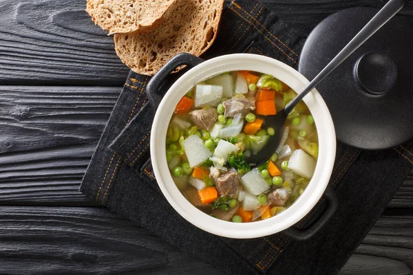 Hairst Bree Harvest Broth traditional Scottish recipe for a classic hearty broth of lamb meat mixed summer vegetables. Horizontal top view from abov — Stock Image Hairst Bree Harvest Broth Traditional Scottish Recipe Classic Hearty Broth Royalty Free Stock Photos