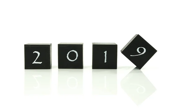 Black blocks with 2018 changing in 2019 — Stock Photo, Image