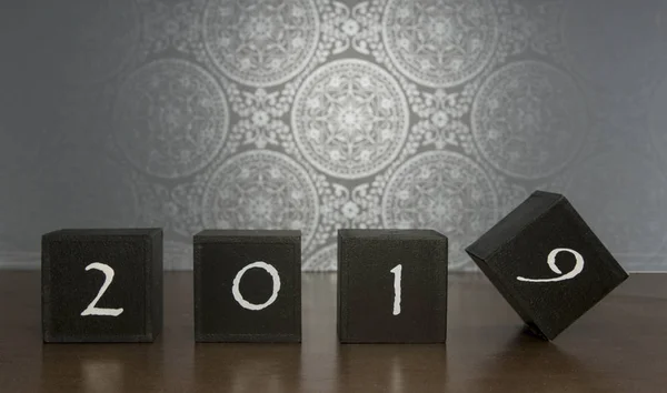 Black blocks with 2018 changing in 2019 — Stock Photo, Image