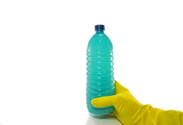 Hand with bottle detergent — Stock Photo, Image