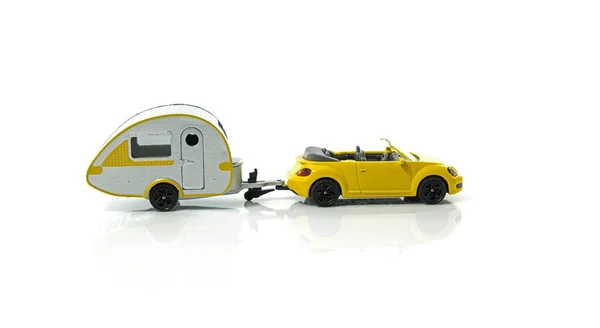 Caravan and yellow car for vacation — Stock Photo, Image