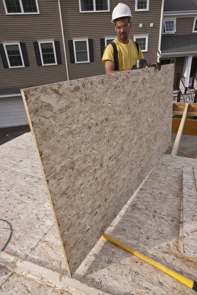 Carpenter Moving Particle Board Building Construction Site — Stock Photo, Image