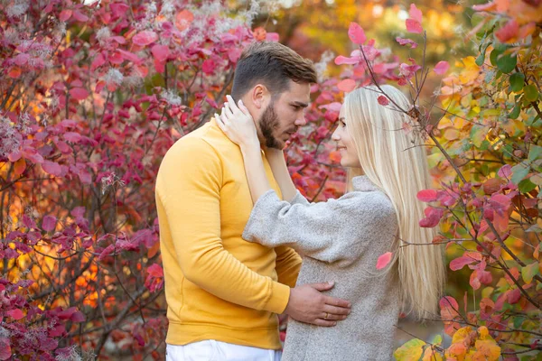 Young Man Neat Beard Yellow Sweater Hugs Long Haired Blonde — Stock Photo, Image