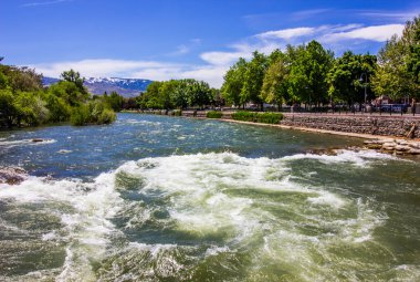 Rushing Waters Of Truckee River Along River Walk clipart