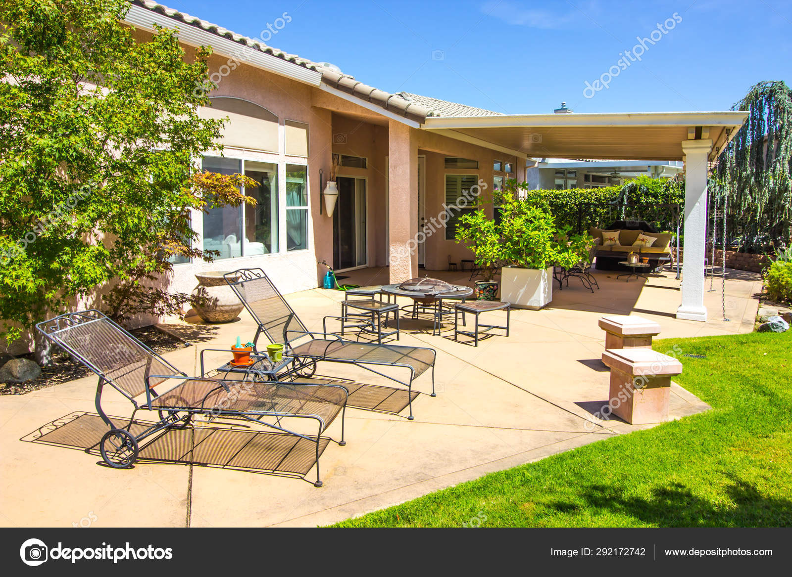Outdoor Lounge Chairs Fire Pit At Modern Home Patio Rear Yard