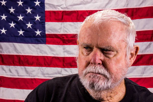 Angry Old Vietnam Vet In Front Of American Flag