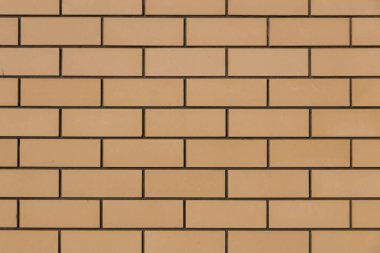 Sarı tuğla cephe doku.