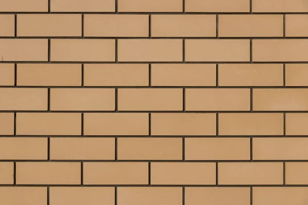 Sarı tuğla cephe doku.