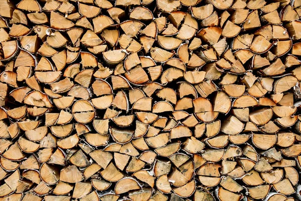 Birch wood for fireplace or stove, neatly folded, Warehouse for firewood for stove.