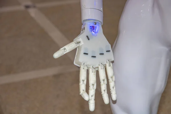 Android robot hand, open palm. Robot-human friendship concept.