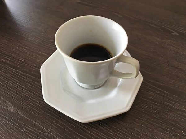 Uma Xícara Porcelana Com Café Mesa — Fotografia de Stock