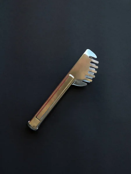 Metal pasta picker — Stock Photo, Image