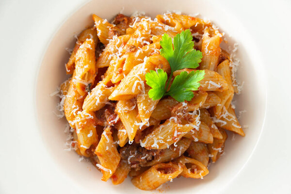 Dish of italian pasta with bolognese sauce