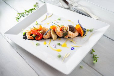grilled seafood  on white plate