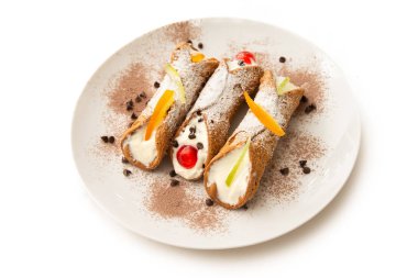 Cannoli Siciliani, typical italian dessert with ricotta and candied fruit