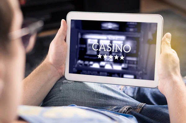 Man Playing Online Casino Tablet Modern Gambling Application Slot Machine — Stock Photo, Image