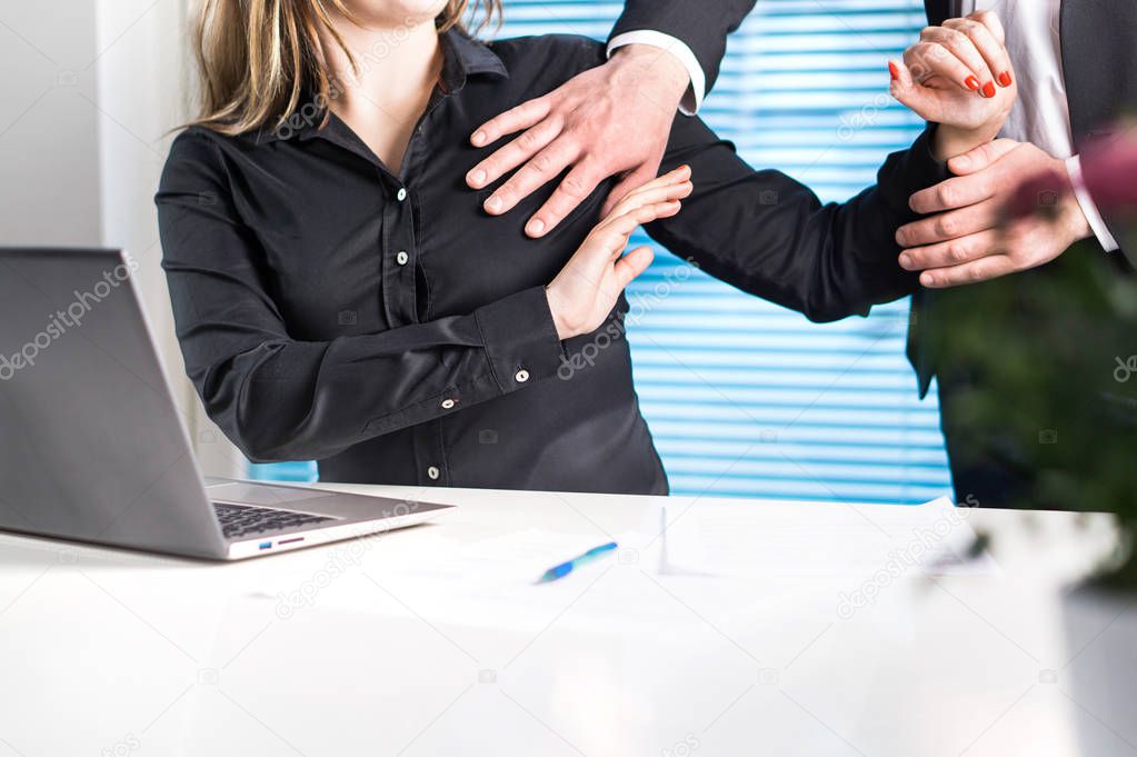 Assistant defending herself from boss in office. Sexual harassment and abuse at work concept. Physical fight at workplace.