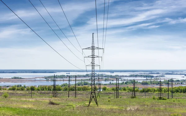 support, mast lines of electric gears, on the background of the Volga River,