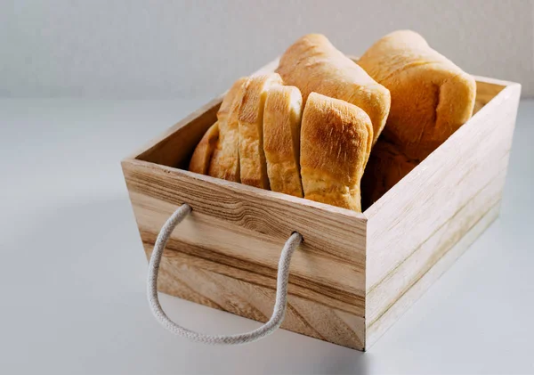 Gluten free homemade bread. Healthy food. Gluten-free pieces of wheat bread in a wooden basket.