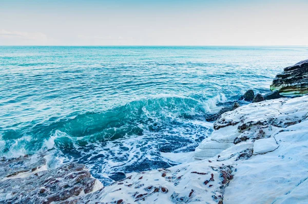 White cliffs by the sea. Sea coast, waves. Rest by the sea.