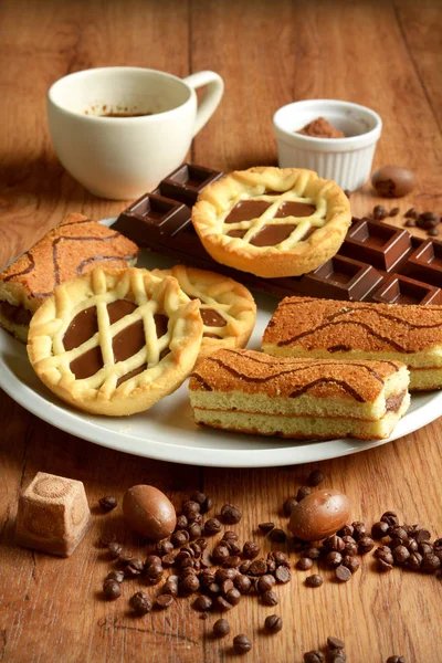 Assorted Chocolate Foods Wooden Table Closeup — Stock Photo, Image