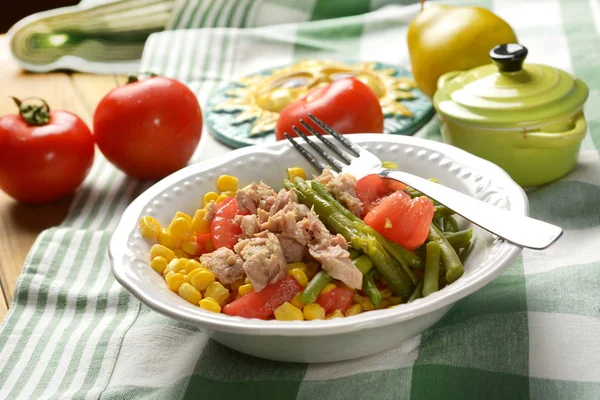 salad of green beans, corn, tomato and tuna - closeup