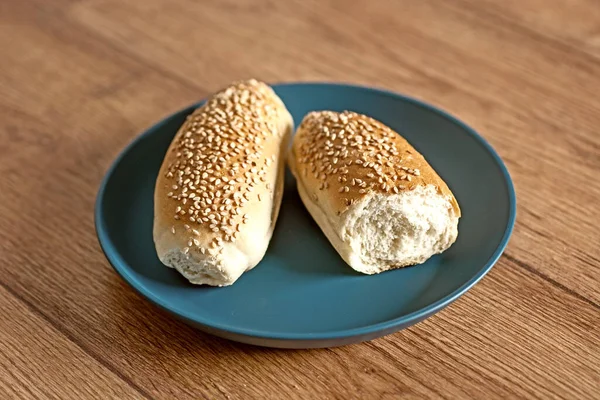 Two Sandwiches Sesame Seeds Blue Plate Closeup — Stock Photo, Image