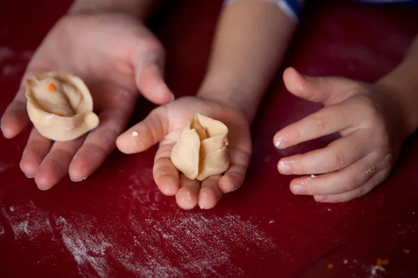 children work with the test: they make pies