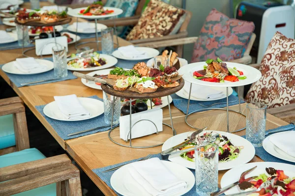 Table in a cafe with food and cutlery