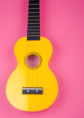Parlak sarı ukulele gitar Gövdesi