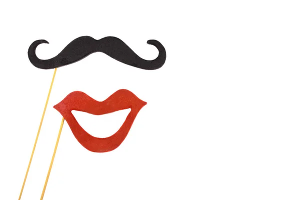 Moustache e boca vermelha em paus de madeira — Fotografia de Stock
