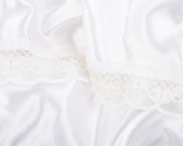 Seda blanca plegada y encaje —  Fotos de Stock