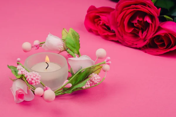 Candle and roses Stock Photo