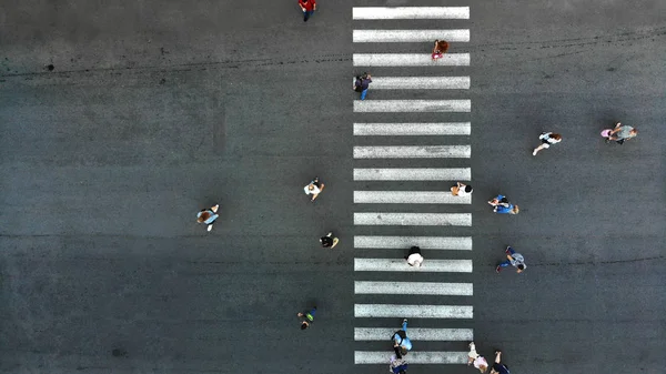 Aerial. Pedestrian crossing view above.