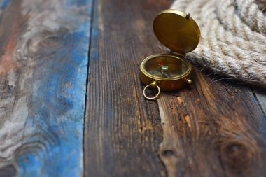 Kullan arka plan. Eski güverte halat ve pusula ile. 