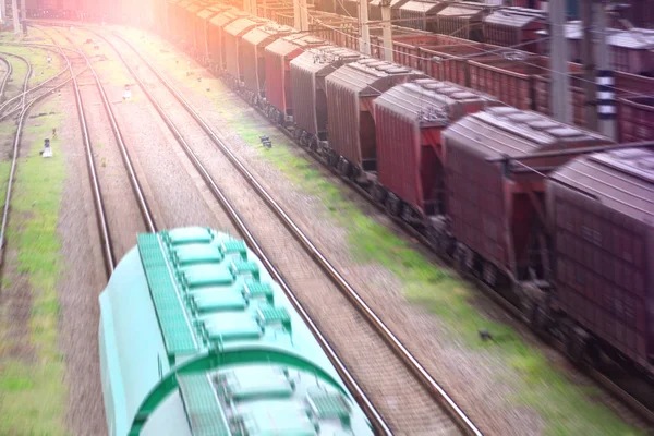 Motion of a freight train on a railway. Blurred.