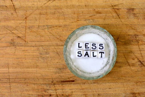 Less Salt Advice Written Ceramic Cubes Letters Salt Shaker Healthy — Stock Photo, Image