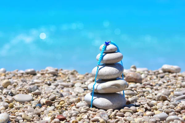 Zen stones on a Turkey beach. Sea pebbles tower. Harmony and stability concept.