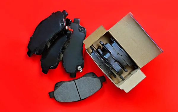 Car Brake Pads Red Background Unboxing — Stock Photo, Image
