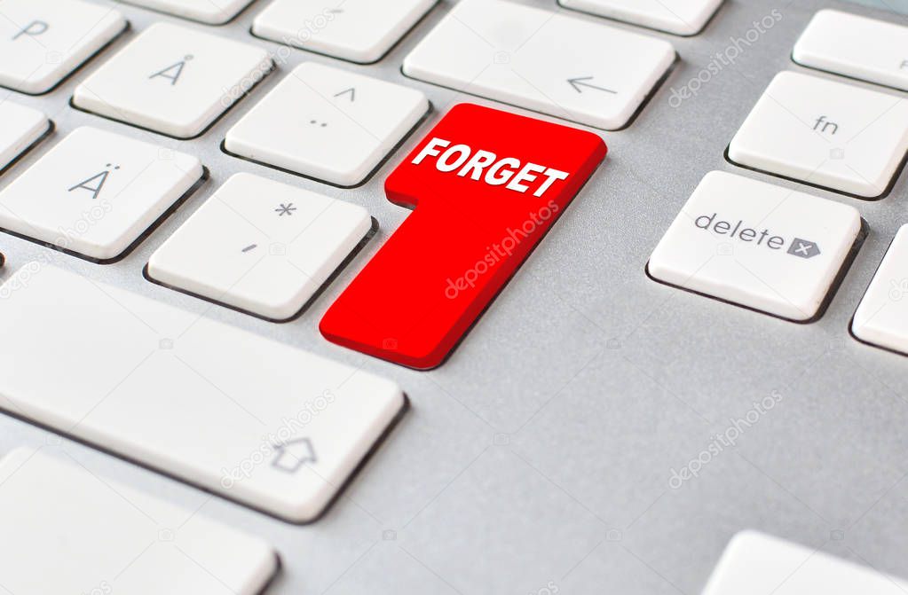 Forget the past concept with written text Forget on a red keyboard button