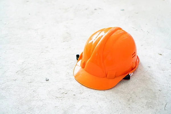 Chapéu Segurança Laranja Sobre Fundo Conrete Construção Construção Ideia — Fotografia de Stock