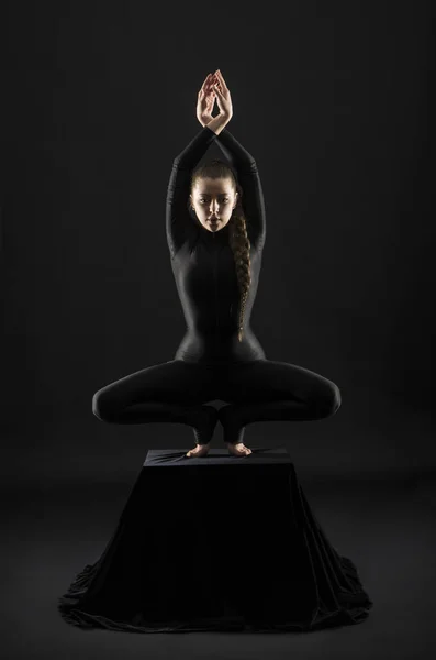 Girl Black Suit Long Hair Performs Gymnastic Exercises Studio Shot — Stock Photo, Image