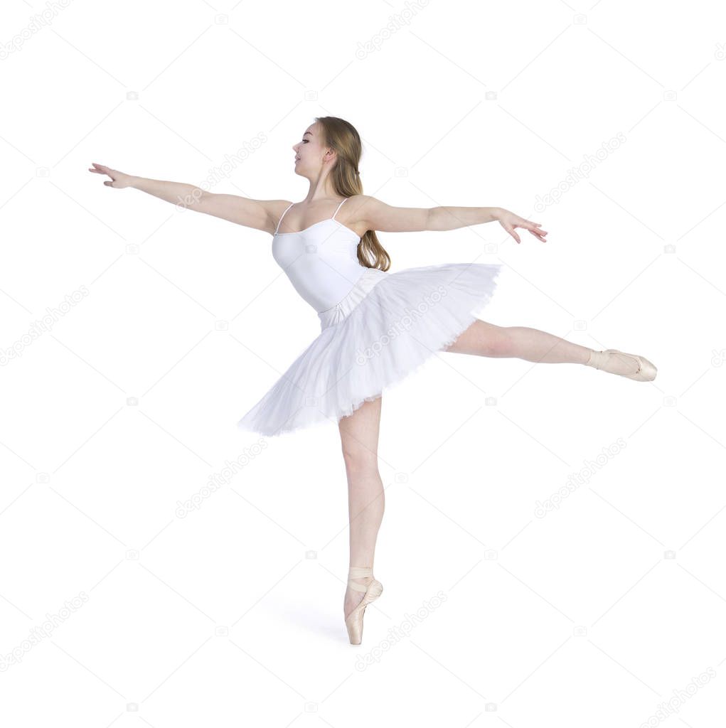 A girl with long hair, in a white tutu dancing ballet.