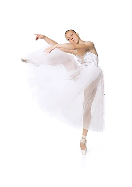 Menina esbelta em um espartilho branco tutu dança balé . — Fotografia de Stock