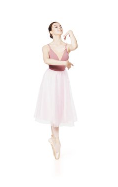 Pembe etek ve bej üst dans bale zarif kız.