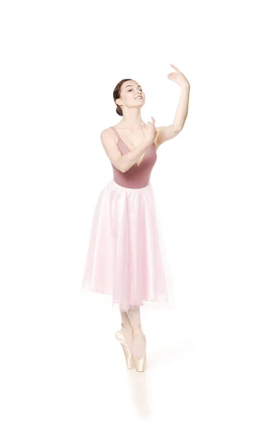 Elegantes Mädchen in rosa Rock und beigem Top beim Balletttanz. — Stockfoto